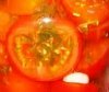 Как приготовить маринованные нарезанные дольками помидоры?